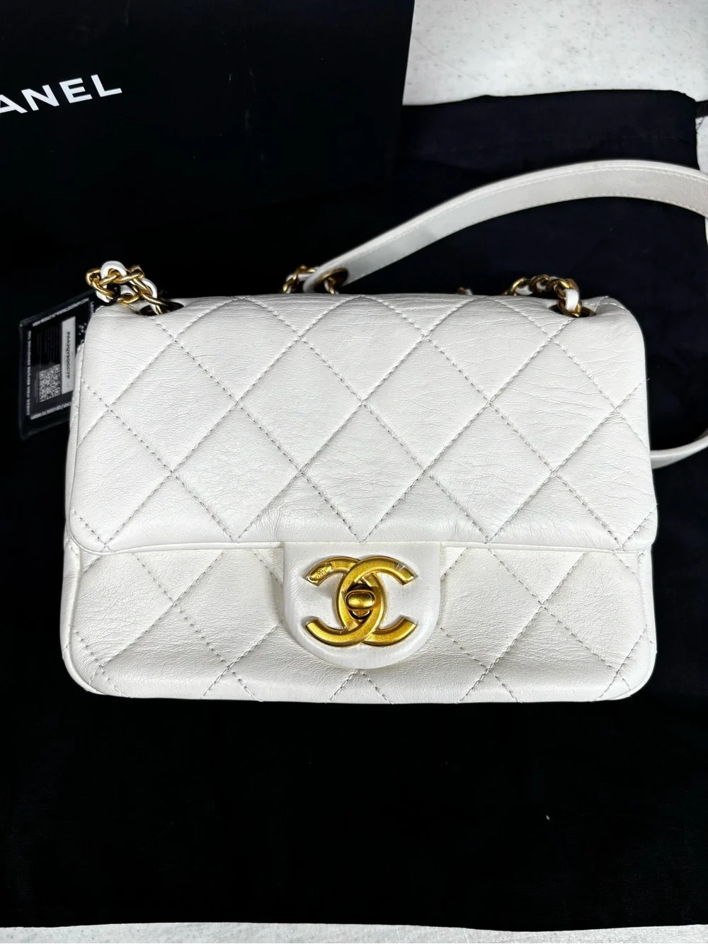 CHANEL White Quilted Leather Mini Flap Bag with Gold Chain Strap